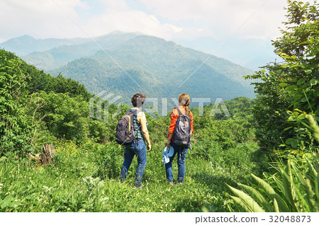 Female hikers in mountains Female hikers in mountains 32048873