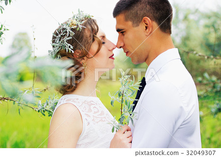 Beautiful young couple in the olive trees.Wedding. Beautiful young couple in the olive trees.Wedding. 32049307