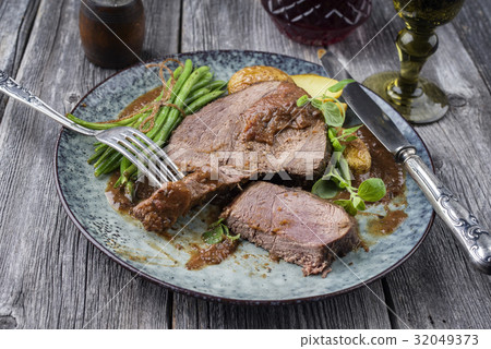 Roast Venison with Vegetable in Deer Sauce 32049373