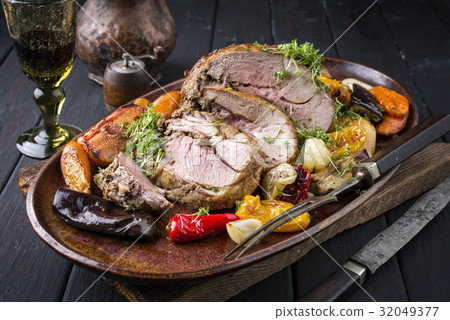 Leg of Lamb with Fruits and Vegetables Leg of Lamb with Fruits and Vegetables 32049377