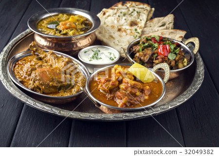 Indian Dished on traditional Thali Indian Dished on traditional Thali 32049382