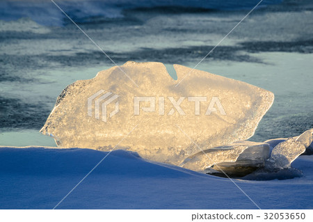 Ice figure in the rays of the setting sun. 32053650