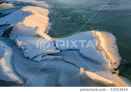 Ice figure in the rays of the setting sun. Ice figure in the rays of the setting sun. 32053654