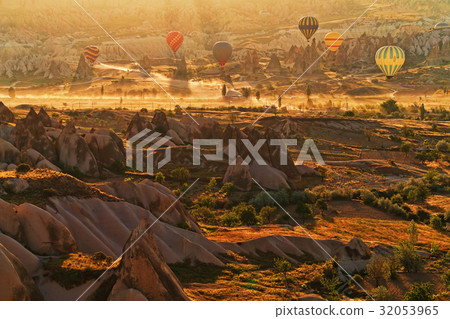 Cappadocia landscape with balloons in the morning Cappadocia landscape with balloons in the morning 32053965
