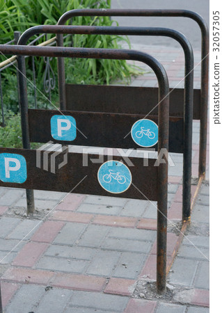 metal bicycle parking and mosaic paths  32057305