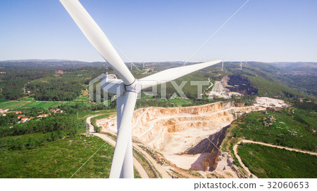 Beautiful aerial close-up view of windmills on the Beautiful aerial close-up view of windmills on the 32060653