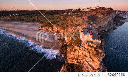 Aerial view of ocean and Nazare lighthouse at 32060668