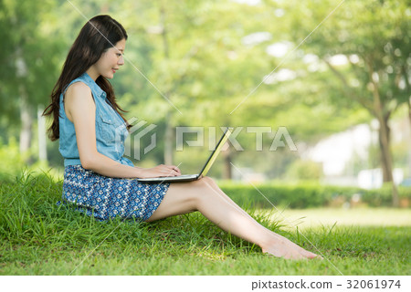 asian woman using digital tablet shopping 32061974