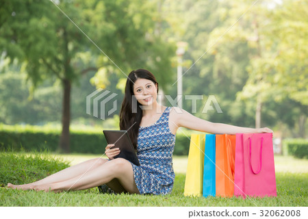 asian woman using digital tablet shopping 32062008