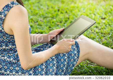 asian woman using digital tablet shopping 32062010