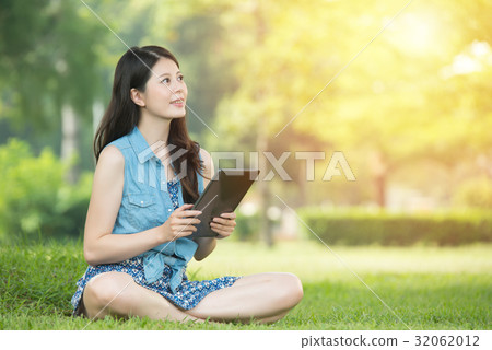 asian woman using digital tablet shopping 32062012