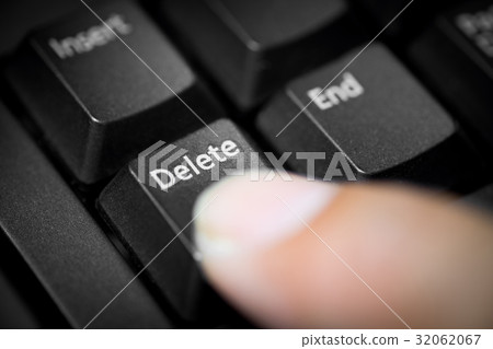 Pointing finger pressing on delete button Pointing finger pressing on delete button 32062067