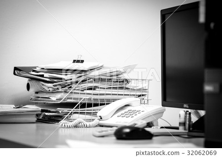 Working table in a mess Working table in a mess 32062069