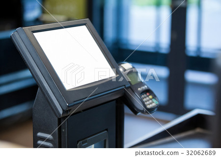 Billing machine and credit card terminal at cash counter 32062689