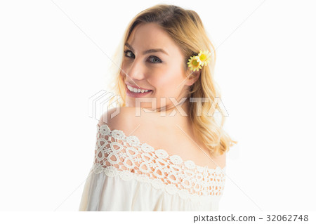 Portrait of beautiful smiling woman against white background Portrait of beautiful smiling woman against white background 32062748