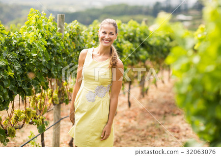 Portrait of smiling female vintner 32063076