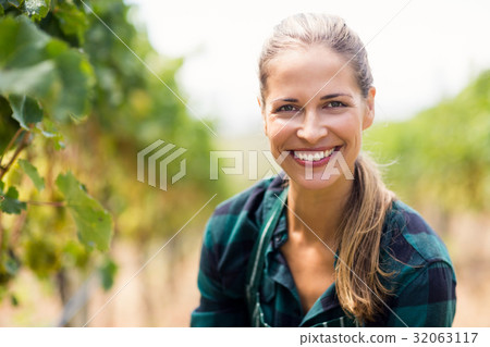 Portrait of happy female vintner Portrait of happy female vintner 32063117