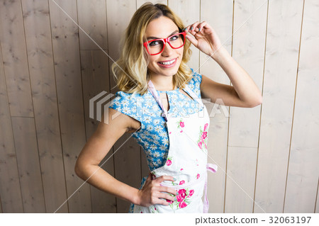 Portrait of beautiful woman posing with spectacles against texture background Portrait of beautiful woman posing with spectacles against texture background 32063197