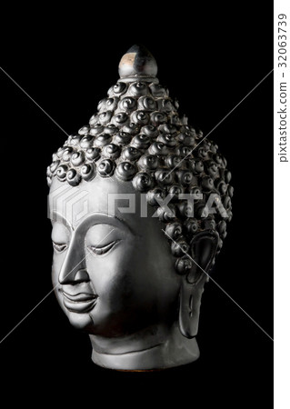 Buddha statue on black background 32063739
