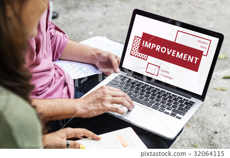 Friends Using Laptop and Discussion about Improvement Word 32064115