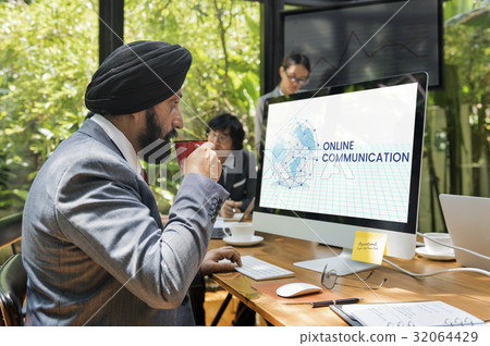 Man working on computer network graphic overlay 32064429