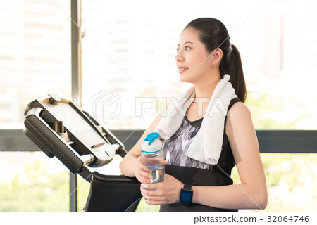asian woman rest holding water bottle asian woman rest holding water bottle 32064746