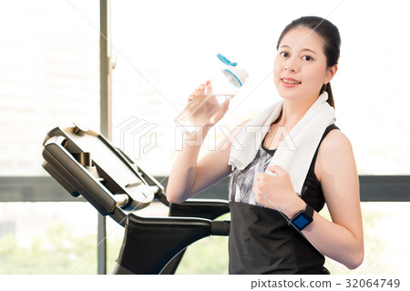 Beautiful asian woman rest holding water bottle 32064749