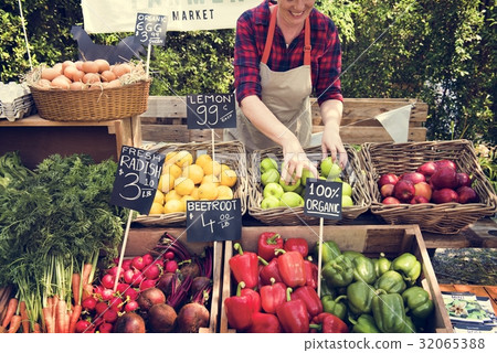 Greengrocer preparing organic fresh agricultural product at farm Greengrocer preparing organic fresh agricultural product at farm 32065388