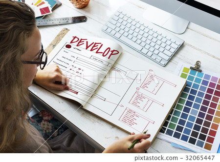 Woman working on notebook network graphic overlay 32065447