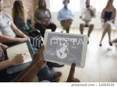 People working on digital device network graphic overlay People working on digital device network graphic overlay 32065616