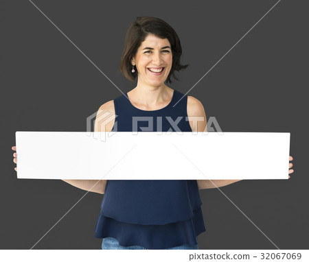 Happiness woman holding blank banner studio portrait Happiness woman holding blank banner studio portrait 32067069