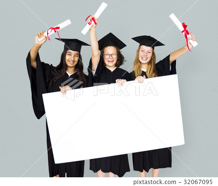 Diverse Students wearing Cap and Gown Showing Blank Copy Space Studio Portrait 32067095