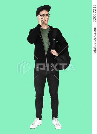 Young man with casual outfit talking phone standing Young man with casual outfit talking phone standing 32067213