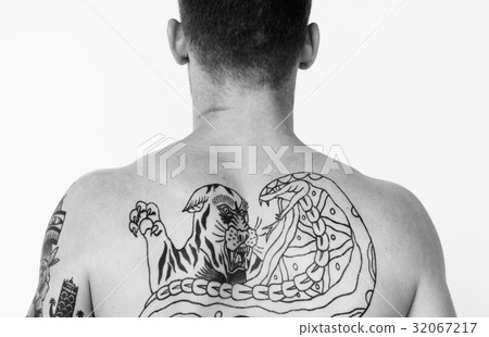 Man bare chest topless in rear view studio portrait 32067217