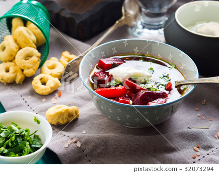 Beetroot soup served in bowls on napkin Beetroot soup served in bowls on napkin 32073294