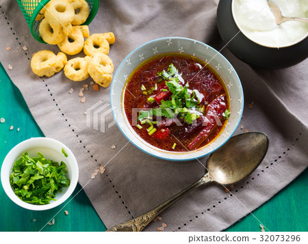 Beetroot soup served in bowls on napkin Beetroot soup served in bowls on napkin 32073296