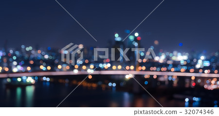 Blurred bokeh city lights background Blurred bokeh city lights background 32074346