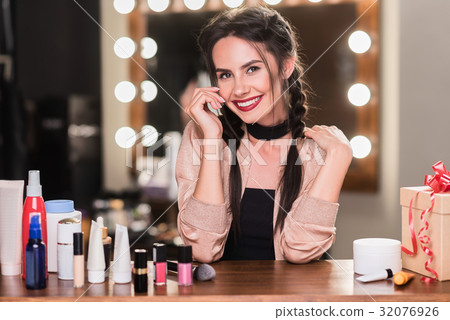 Attractive young woman relaxing in dressing room 32076926