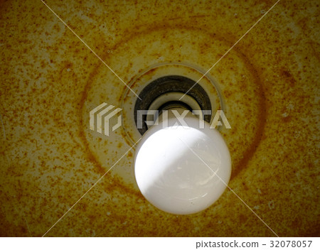 Light bulb with vintage background 32078057