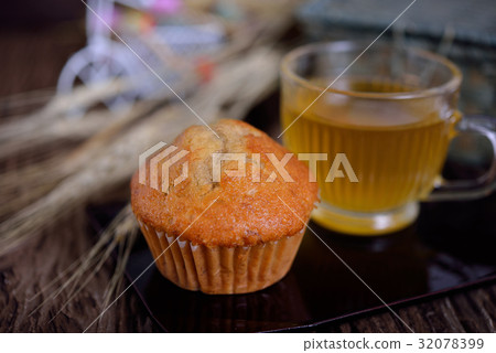 banana cake with a cup Chrysanthemum tea banana cake with a cup Chrysanthemum tea 32078399