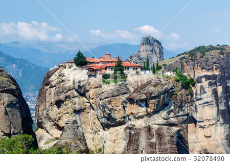 Aerial sunset view on monastery at coast of mountains Aerial sunset view on monastery at coast of mountains 32078490