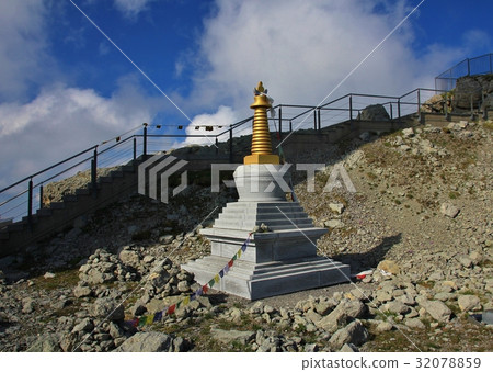 Buddhist stupa and prayer flags on Mount Santis 32078859