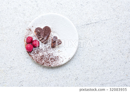 Valentines day dessert with heart shaped chocolate cake Valentines day dessert with heart shaped chocolate cake 32083935