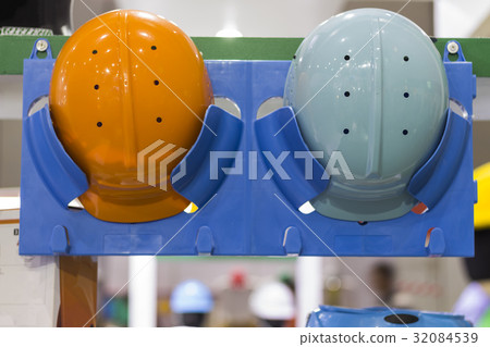 Safety helmets on a shelf ; Working Hard Hats Safety helmets on a shelf ; Working Hard Hats 32084539