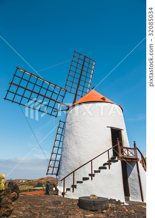 Windmill in cactus garden in Guatiza village 32085034