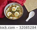 rice with coconut onion sauce and eggs 32085284
