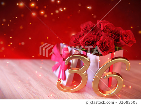 birthday concept with red roses in gift on wooden 32085505