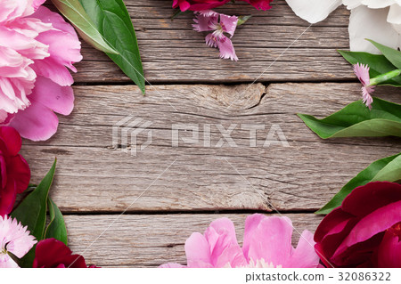 Garden peony flowers on wood Garden peony flowers on wood 32086322