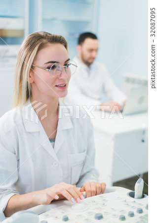 Young Scientists working at chemisty laboratory 32087095