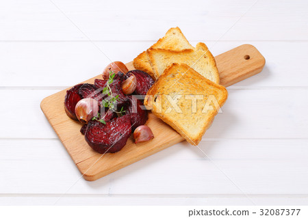 baked beetroot and garlic with toast baked beetroot and garlic with toast 32087377